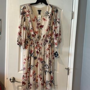 Dress. Newly purchased. Did not need. Lost receipt.